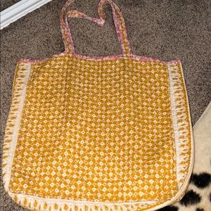 WORLD MARKET Yellow and pink REVERSABLE Printed Quilted Tote Bag with Pink Trim